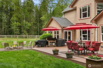 Large easy-care composite, entertaining size deck and fire pit. Exterior cedar siding.