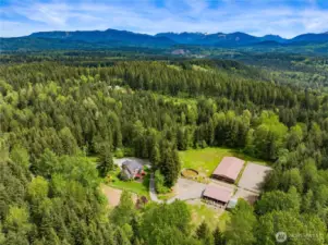 20 Acre site in Tolt River Highlands. Idyllic setting with Barn, Covered and Uncovered Arenas, Round Pen and Pasture.