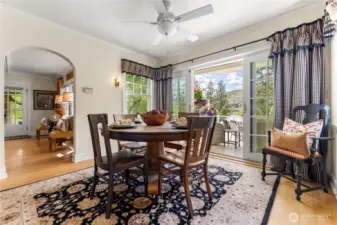 Bright and inviting, this light-filled dining area captures the essence of ranch living—gather, host, and dine with views of river, trees, and sunlit hills.