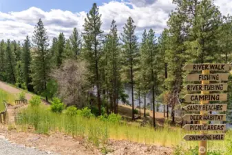 Follow the trail to the river for endless outdoor fun—fishing, tubing, swimming, or simply relaxing by the water’s edge under the trees.
