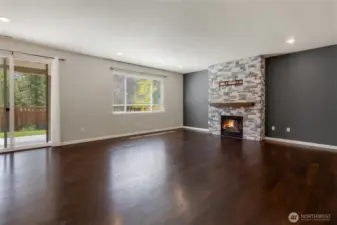Living room that leads to backyard