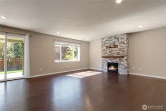 Living room. Patio slider leads out to you backyard