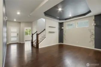 Great view of dining room, staircase, office and entry