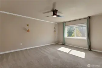 Primary bedroom with hanging wall scones
