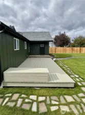Stepping stone walkway around deck.