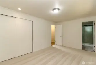 Main level primary bedroom.  New carpet throughout the home
