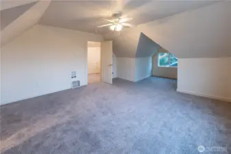 One of the two huge upstairs bedrooms.  I love the fun nooks and crannies and angles.