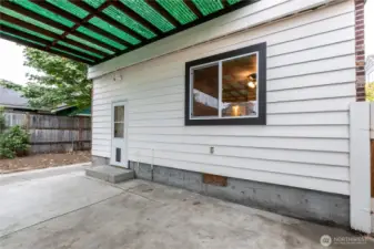 Covered patio off of rear of home is enjoyable all year round- shade in the summer and shelter in the rainy season.