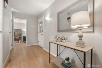 Welcoming large entrance with beautiful hardwood flooring & new interior  paint!