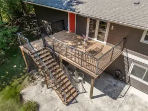 - And the deck just off the dining nook & kitchen for easy backyard viewing and barbecuing! "The original home featured a full wrap-around deck that we always dreamed of recreating! It would look at our greenhouse, garden and pastoral yard with the creek murmuring in the background."
