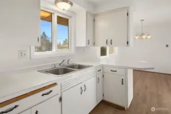 new flooring in kitchen and dining