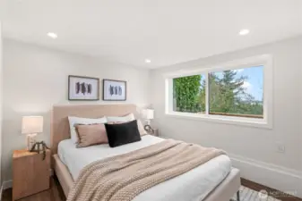 Lower level guest room with views of the sound