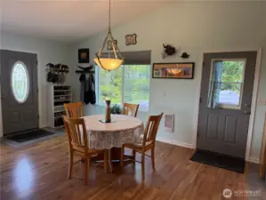 Dining area can seat up to 10 guests. Some furniture can come with this lovely home if desired.
