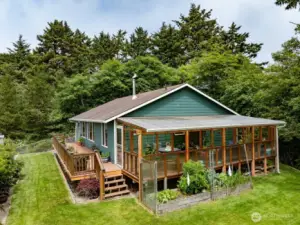 Included is this wonderful sunroom, perfect for entertaining in any type of weather. Plants love it too.
