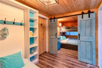 Double barn doors can separate the bunk beds in the addition