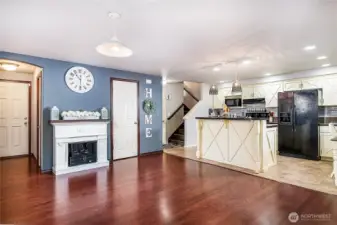 The warmth of the gleaming hardwood floors are so inviting!
