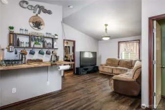 Great room/theater area complete with custom decorator coffee/beverage bar!! So stylish!