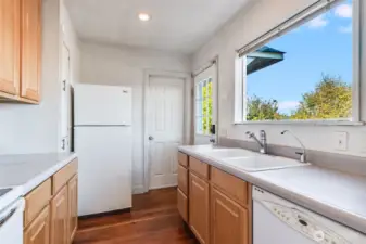The kitchen also has a huge window with a territorial view.