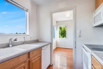 Another kitchen view showing the access to the dining area.