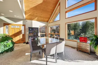 Cathedral tongue-and-groove wood ceilings with exposed beams  Masland Telluride carpet / Ceiling fan  Hunter Douglas Silhouette shadings on lower windows  Virtually staged