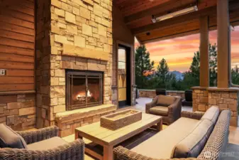 Covered outdoor fireplace and heaters