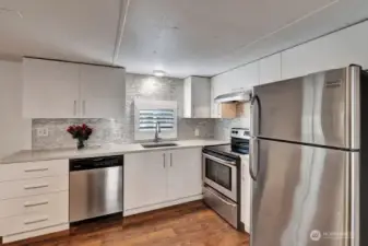 Quartz countertops & stainless steel   appliances.