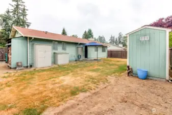 Again, seller had huge trees removed and yard is ready for the new owners personal touch! These two rubber maid storage units will also stay with the home.