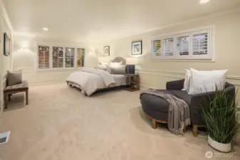 Another view of the primary. There is plenty of room for lounging, stretching, sleeping... you'll never want to leave this dreamy suite.