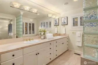 A spa like primary bathroom with perfect bones for customizing or making it your own.