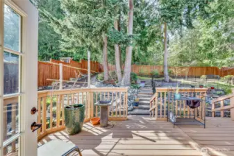 Terraced backyard fully-fenced. There is a gate in the backyard which leads directly to Cappy Trails.