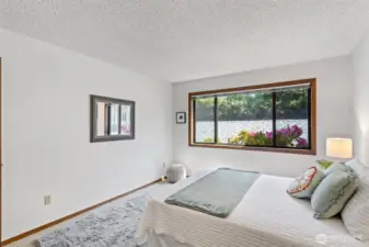 This 2nd bedroom has extra space for seating, a desk, drawers or even sharing with your sibling.