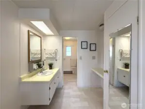 Primary ensuite with plenty of counter space and room for your morning routines