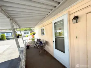 Enjoy your morning coffee on your spacious covered porch.