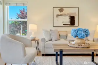 Living room.  The entire interior has recently been painted along with the addition of a new trim package.  All new white doors and baseboards.