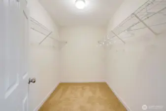 Primary walk in closet.