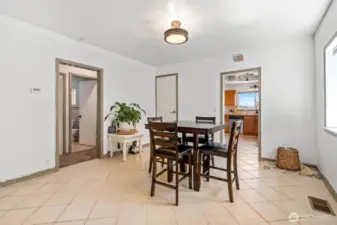 Dining, Hall to bath and bedrooms to the left and Kitches access to the right.