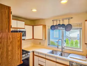 Full kitchen with appliances.