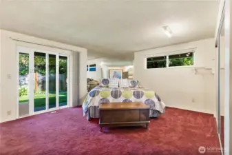 Large Primary Bedroom with Slider to backyard.