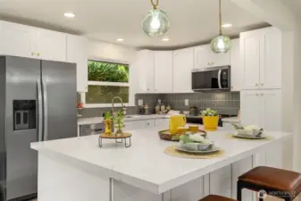 All New Cabinets, Quartz Countertops, & Brand New Stainless Appliances.