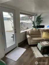 Step right out to the deck from living room.