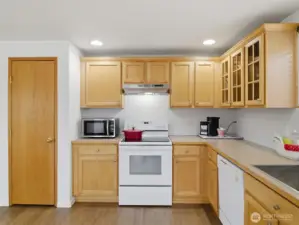 Kitchen Pantry Area and Cabinetry with glass-front doors.