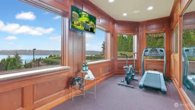 Home Gym with lake view.