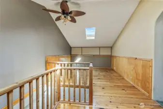 Primary suite upstairs over kitchen area.