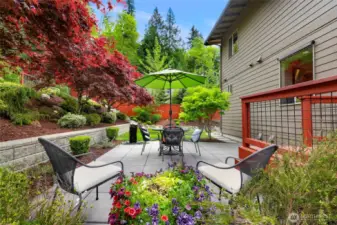Spectacular private backyard, fully landscaped oasis, a small deck off the living room/kitchen that flows out to a spacious patio with a stone water feature.
