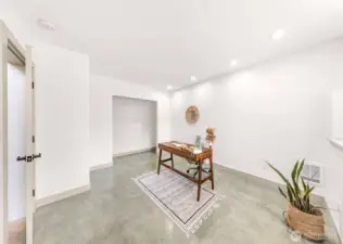 Complete with a window, closet, durable concrete floors, space can be used as a home gym, guest bedroom, office space, extra storage space, whatever you need.