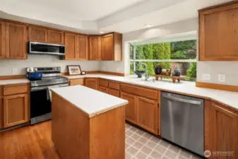 Stainless appliances compliment the kitchen.