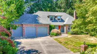 Gorgeous home in North Creek Estates with lush landscaping...