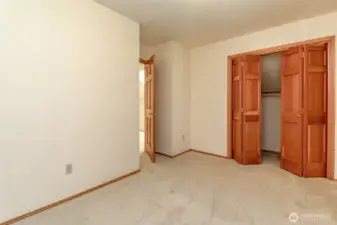 Double closet with solid fir doors.