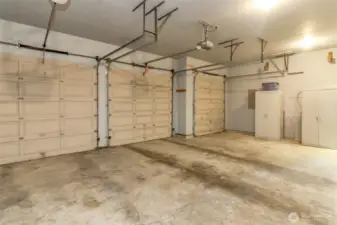 Garage has the 2 main doors with automatic openers. Lots of storage room in here!