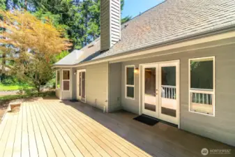 Doors from primary bedroom and great room lead out to this spacious deck.